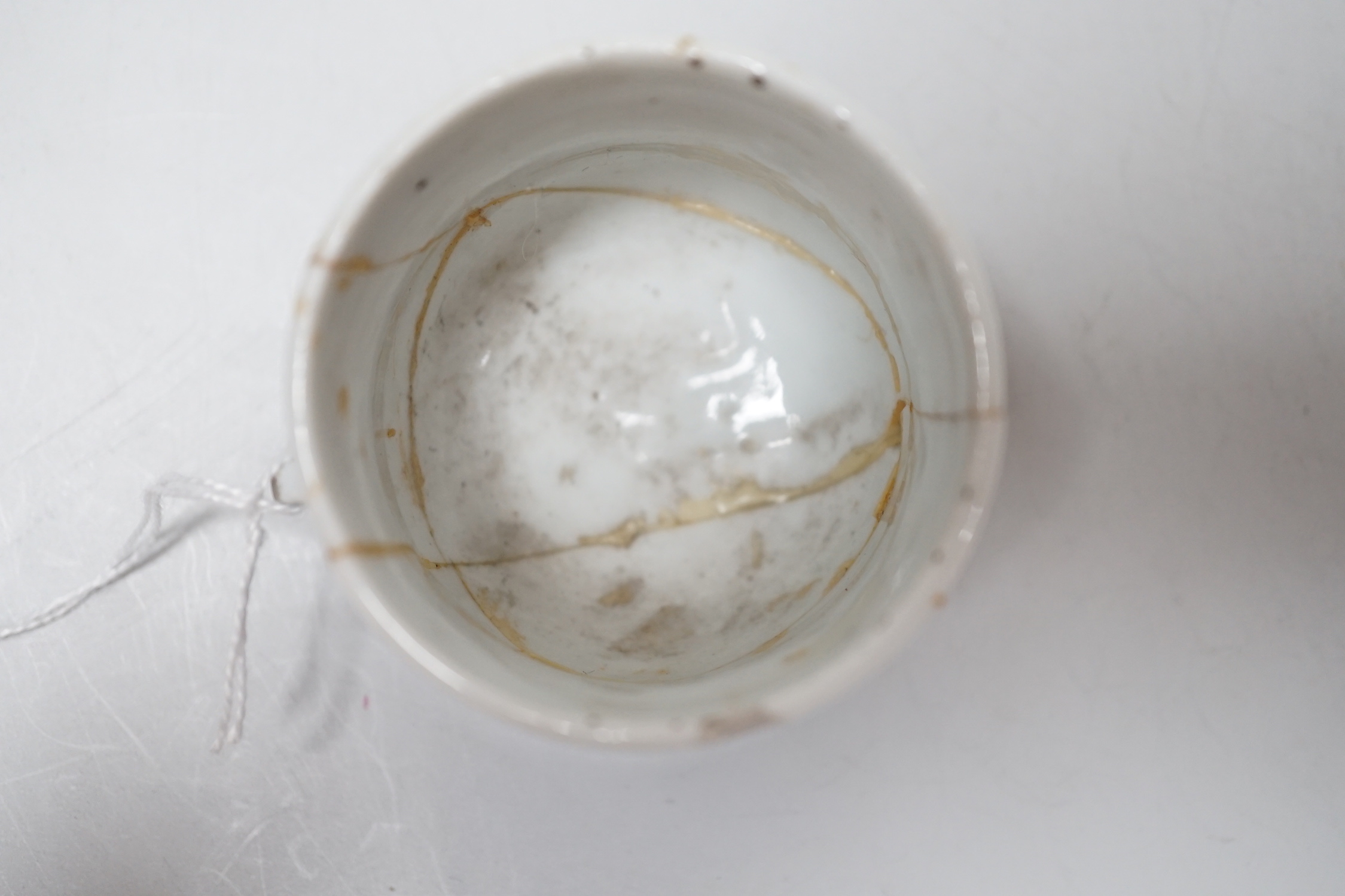 Ten Chinese porcelain bird feeders, 19th/20th century, 4.5cm